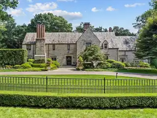 Meticulously Renovated Stone Tudor Home