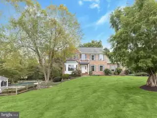 Breathtaking Brick Colonial on over Three Acres