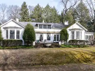 Charming French Colonial on Nearly Three Acres