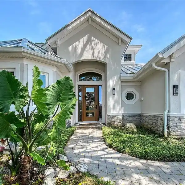 REFINED COASTAL LIVING WITH RESORT-STYLE AMENITIES