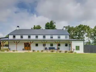 One-Of-A-Kind Custom-Built Barndominium with Two Car Garage