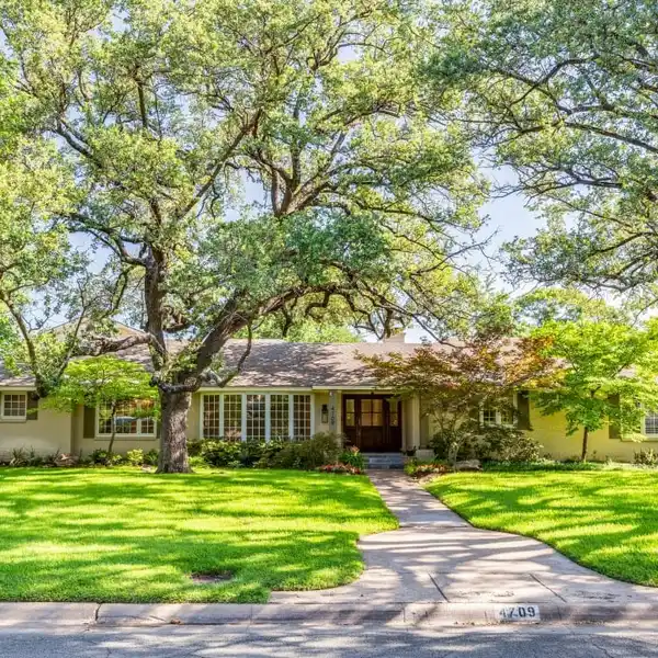 STUNNING CORNER LOT HOME WITH POOL