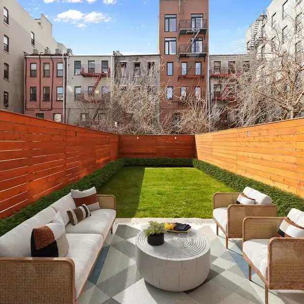 CHARMING PARK BLOCK TOWNHOME IN PRIME HARLEM LOCATION