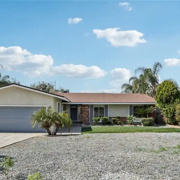 TWO HOMES ON ONE HUGE LOT