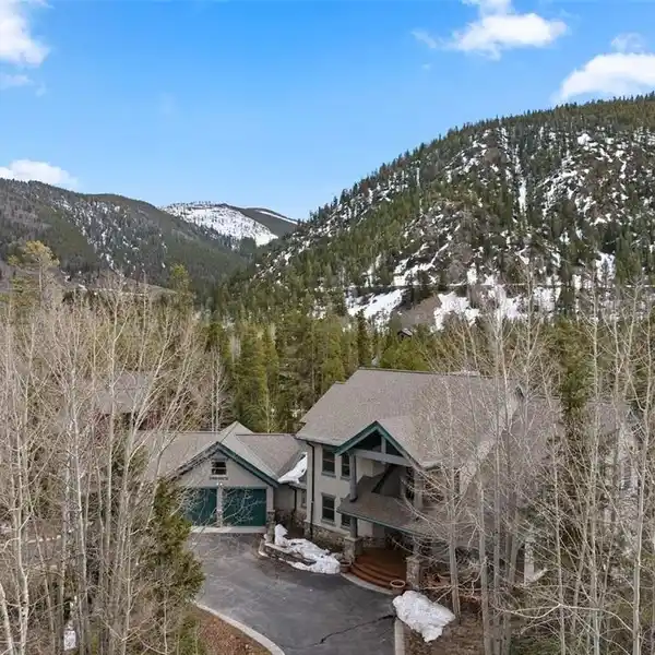 UNPARALLELED RIVERFRONT GOLF COURSE SETTING IN A COVETED SKI COMMUNITY