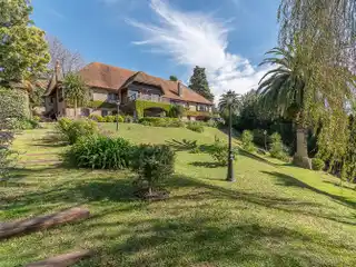 Iconic Patagonian Style Mansion on a Private Acre
