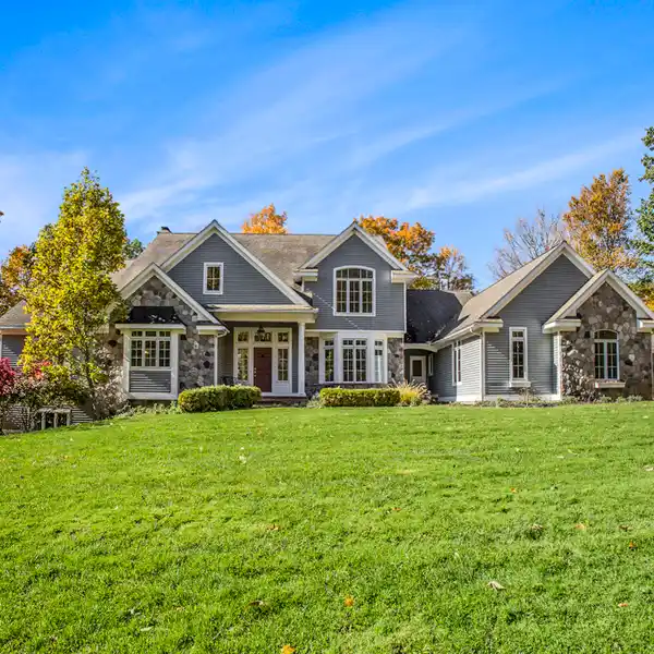 CUSTOM-BUILT THORNAPPLE RIVER HOME WITH POOL & PANORAMIC VIEWS