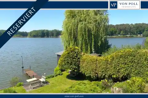 Unique Lakeside Property with a Detached House