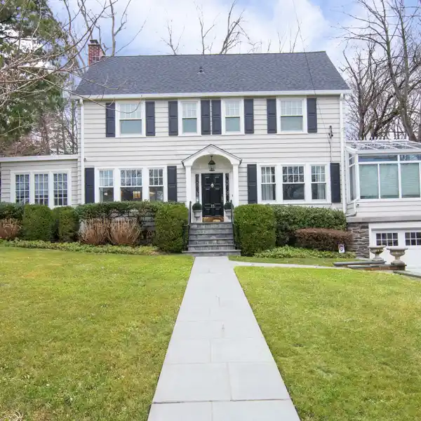 CLASSIC TURN-KEY COLONIAL ON A MOST DESIRABLE STREET
