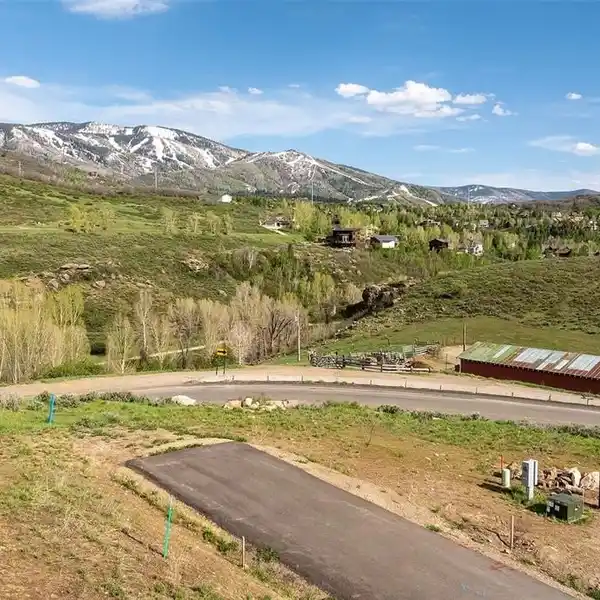 UNBEATABLE STEAMBOAT LOT WITH HOME PLANS