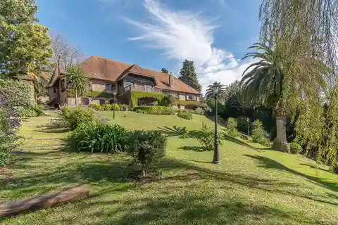 Iconic Patagonian Style Mansion on a Private Acre