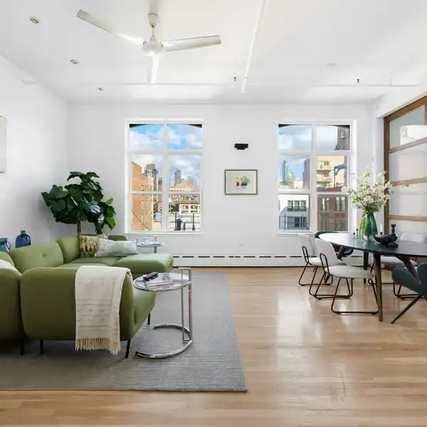 DRAMATIC AND CREATIVE PENTHOUSE FILLED WITH ABUNDANT NATURAL LIGHT