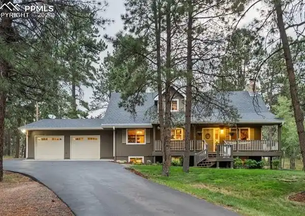 SPACIOUS HOME ON OVER FIVE PRIVATE ACRES