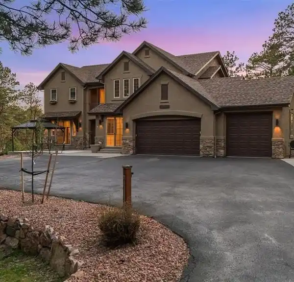 ENCHANTING CUSTOM HOME IN EXCLUSIVE GATED COMMUNITY