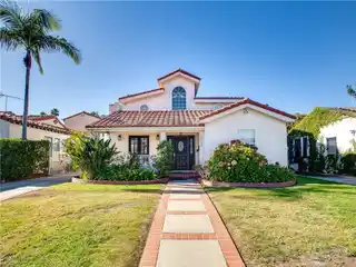 Elegant Estate with Expansive Dual-Lot Grounds