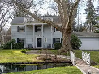 Stunning Colonial Home in a Garden Setting