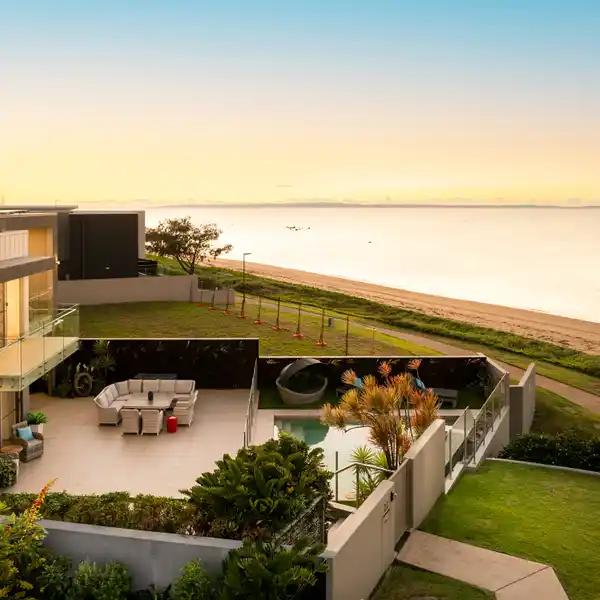 GORGEOUS BEACHFRONT TRI-LEVEL HOME