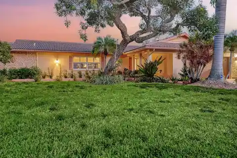 Classic Canal-Front Masonry Beach Home