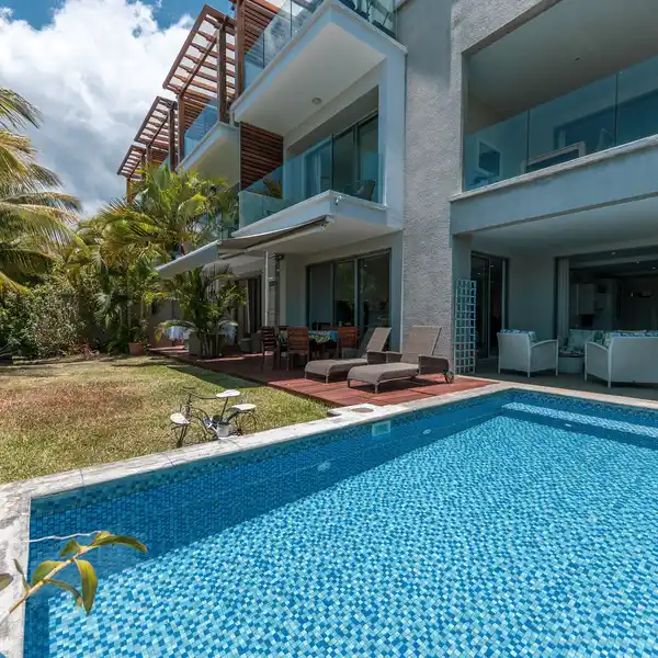 THREE BEDROOM GROUND FLOOR UNIT WITH PRIVATE GARDEN AND POOL