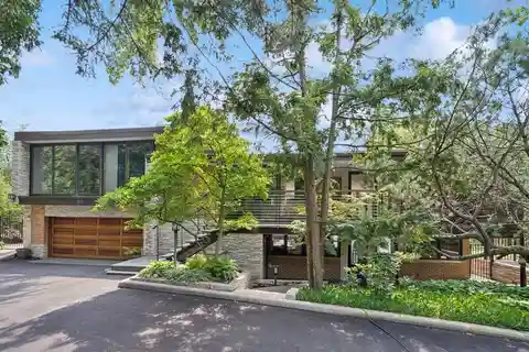 Sleek Mid-Century Modern Home on a Lush Lot