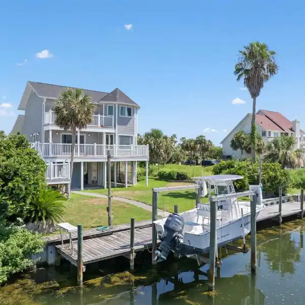 COASTAL RETREAT IN SOUGHT-AFTER LAFITTE COVE