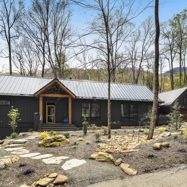 SLEEK CONTEMPORARY CUSTOM HOME IN GATED LAUREL RIDGE