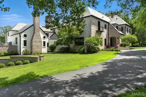 Timeless French Manor on Private 1.17 Acres