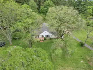 Elegant Custom Home on 9+ Private Acres