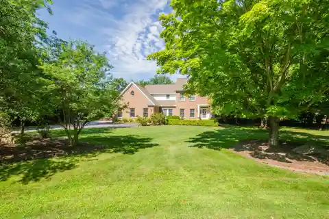 Architecturally Designed Custom Home on a Lush Acre-plus