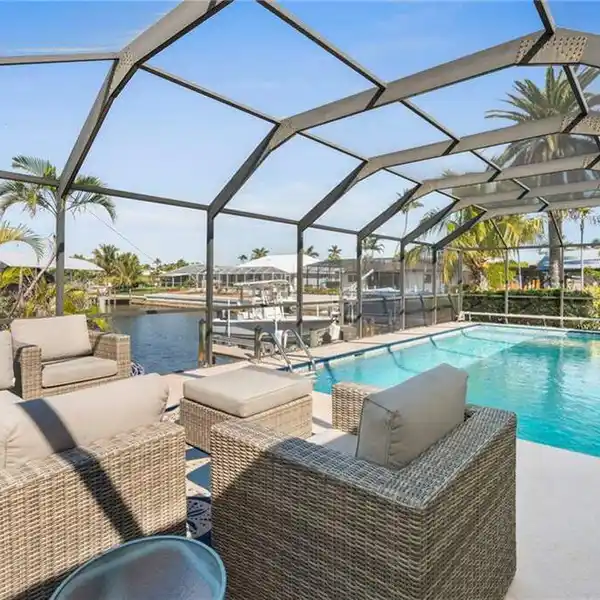 CHARMING HOME ON AN OVERSIZED CORNER LOT IN MARCO ISLAND