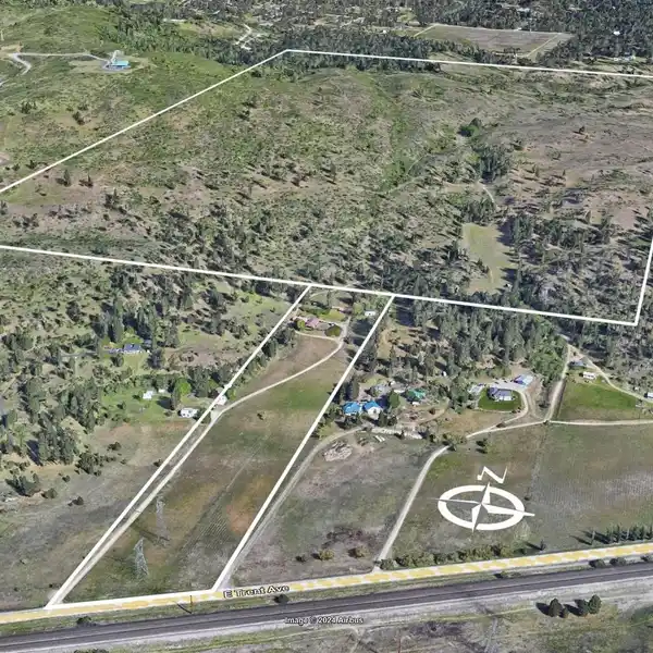 HUGE ACREAGE WITH FARMHOUSE AND MULTIPLE OUTBUILDINGS
