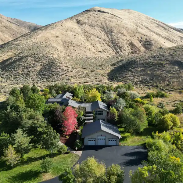 MASTERFULLY DESIGNED HOME WITH A UNRIVALED LANDSCAPE