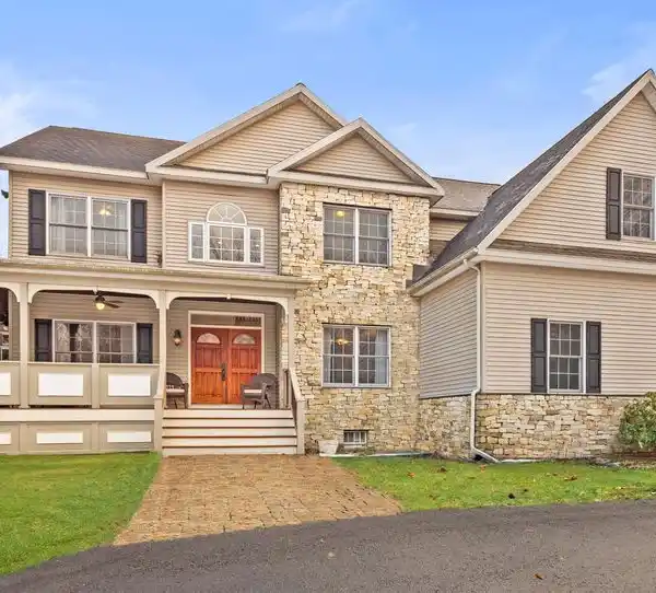 EXQUISITE HOME ON OVER SIX ACRES