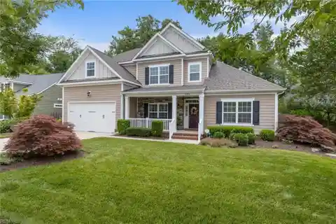 Exquisitely Upgraded Home Surrounded by Professional Landscaping