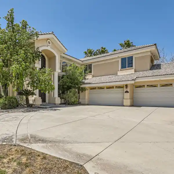 GORGEOUS CUSTOM HOME IN DOUBLE GATED COMMUNITY