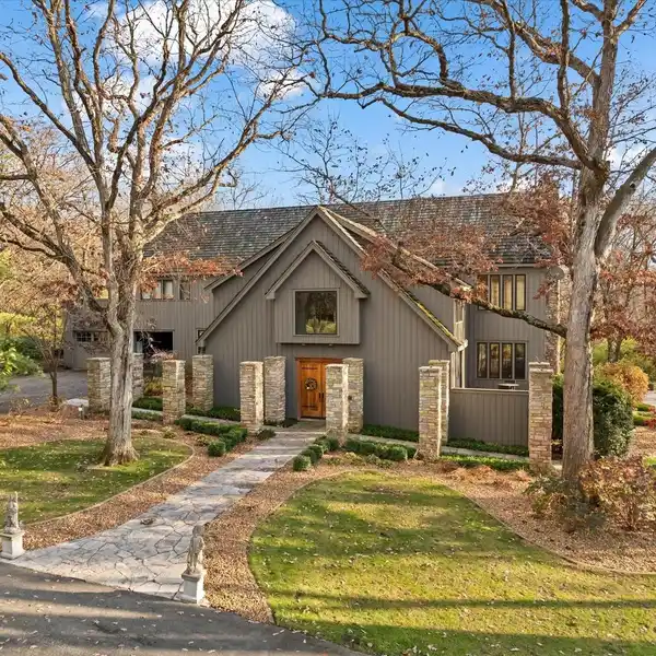 EXPANSIVE LODGE HOME ON EIGHT WOODED ACRES
