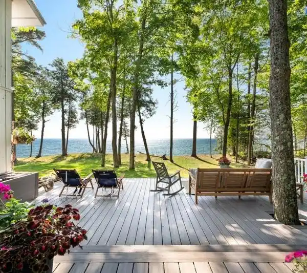 LAKEFRONT LIVING WITH CUSTOM FINISHES THROUGHOUT
