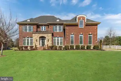 Elegant Brick Estate in Gated Fairwood Community