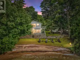 Rare Waterfront Home with Private Beach