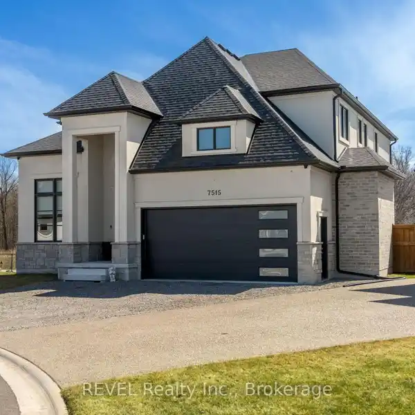 STUNNING 2-STOREY STONE & STUCCO HOME