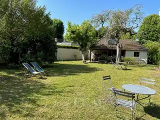 Elegant Century Home with Garden Oasis