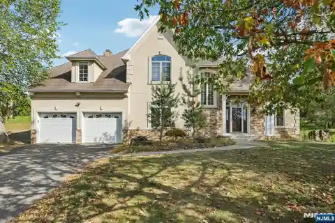 Beautifully Maintained Colonial Home on a Large Lot