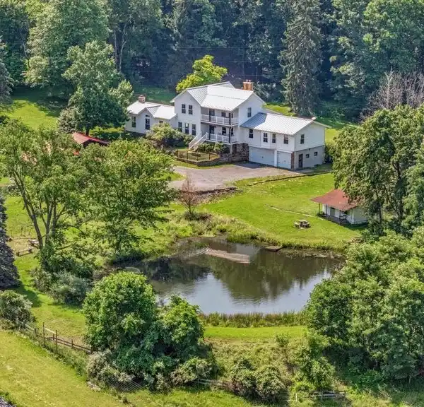 REDESIGNED FARMHOUSE RETREAT ON 20 SCENIC ACRES