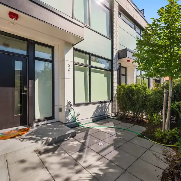 IMPECCABLE THREE-LEVEL TOWNHOME
