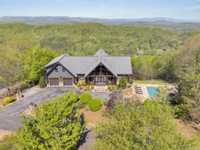 GRAND MOUNTAINTOP CANADIAN LOG HOME