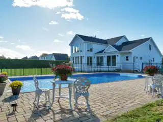 Lovely Two-Story Traditional with a Heated Pool for Rent