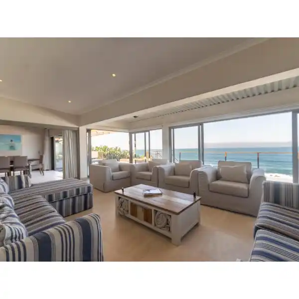 RARE BEACHFRONT GEM ON AN EXCLUSIVE STREET
