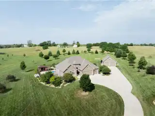 Custom Retreat in the Prestigious Bluffs at Whiskey Ridge