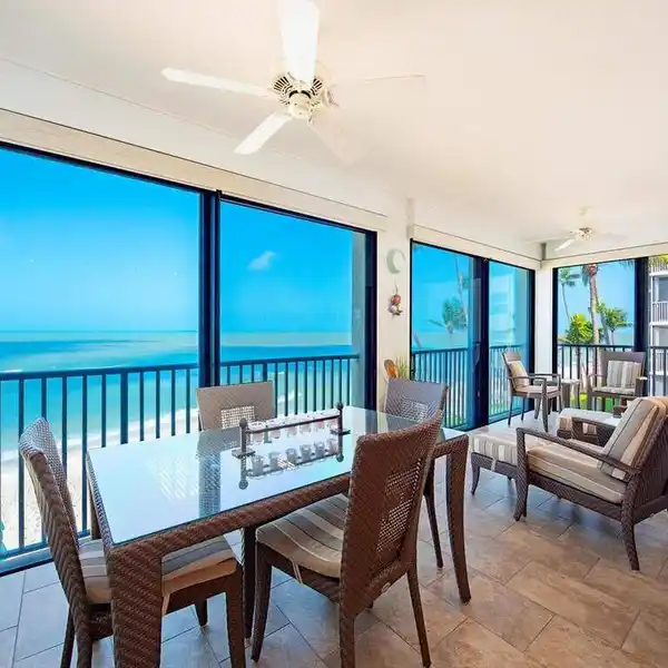 BEACHFRONT END UNIT WITH SWEEPING GULF VIEWS