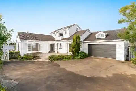 Rare Dual-Home Retreat on Massive Grounds